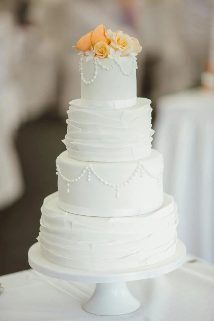 Elegant Tiered Cake with Floral Details